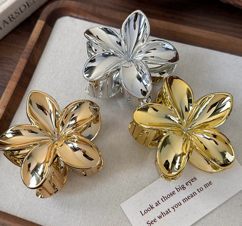 Metallic flower claw clip